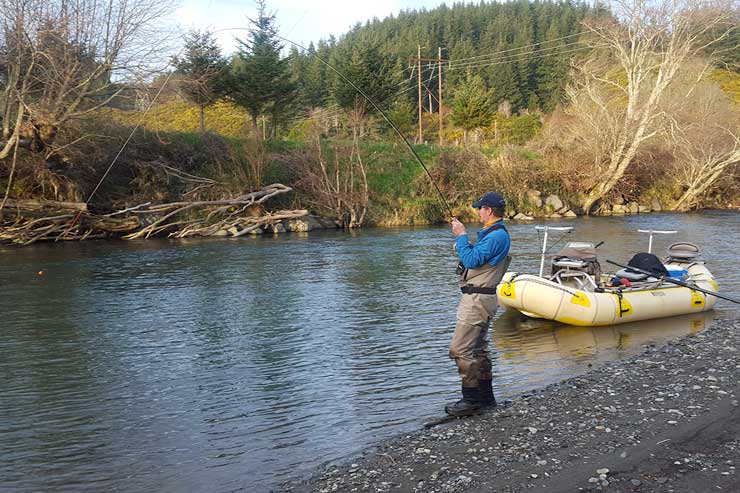 An angler hooked up on one of our coastal Oregon steelhead rivers.
