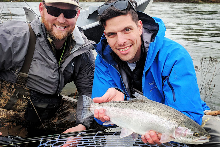 Guide Ben Thompson and guest with a nice American River steelhead