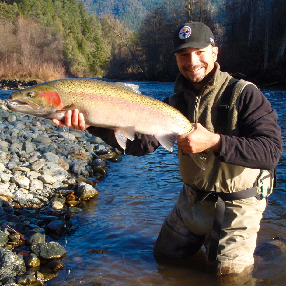 Guide Dax Messett with a huge Trinity River steelhead