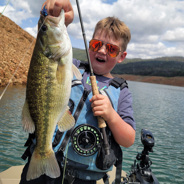 A smallmouth bass fooled by a surface popper on the California Delta