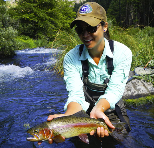 Guide Leslie Ajari with a nice Rainbow Trout on the Pit River