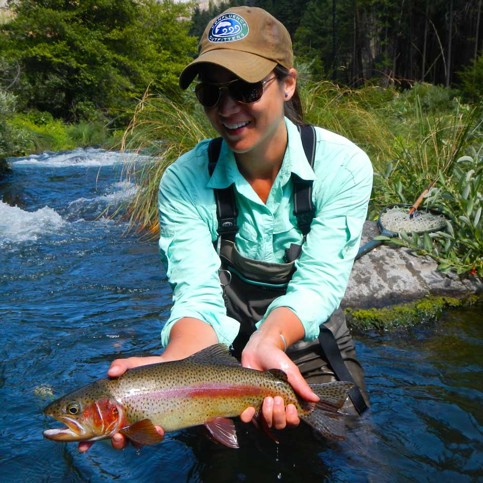 Guide Leslie Ajari with a colorful Pit River rainbow