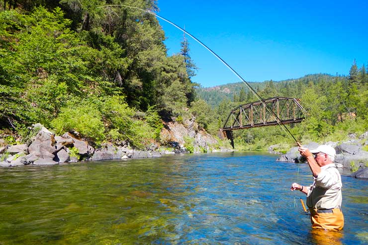 An angler hooked up on the Upper Sac