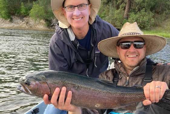 Guide Dylan Woodrum and guest with a Williamson River rainbow
