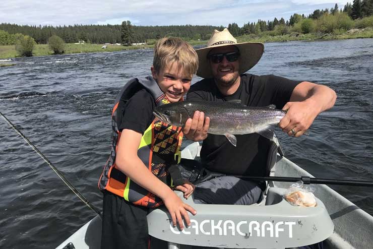 Guide Dylan Woodrum on a day off with his son on the Williamson River